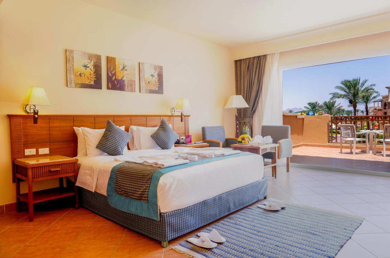 Charmillion Club Aquapark Hotel Sharm el-Sheikh Exterior photo A room at the Hilton Sharm El Sheikh